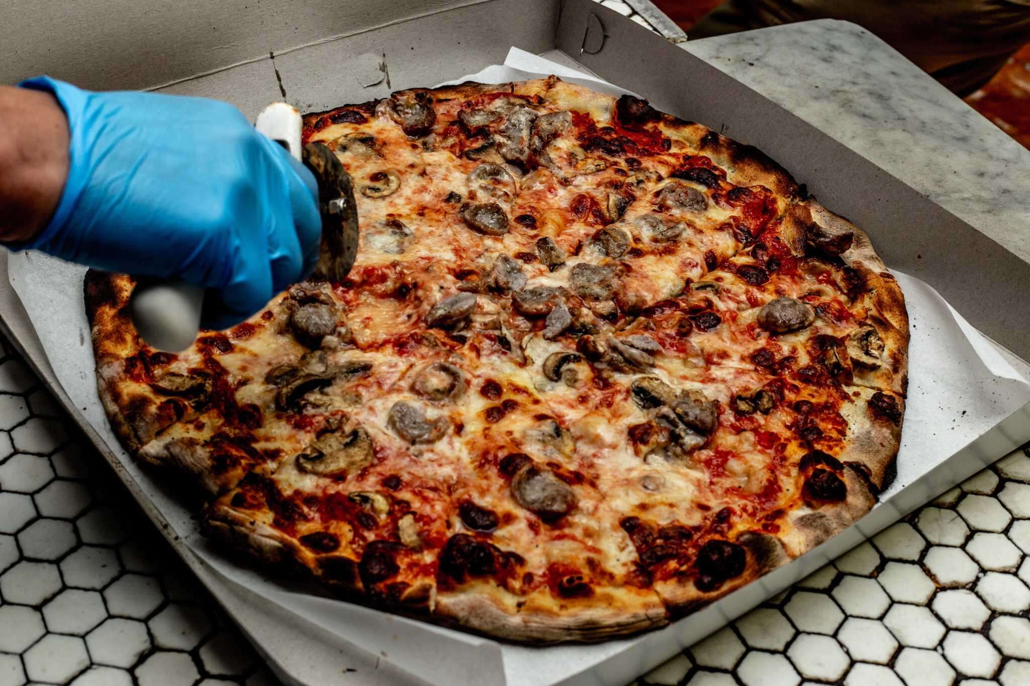 New Haven pizza makers share tips for an extra busy National Pizza Day