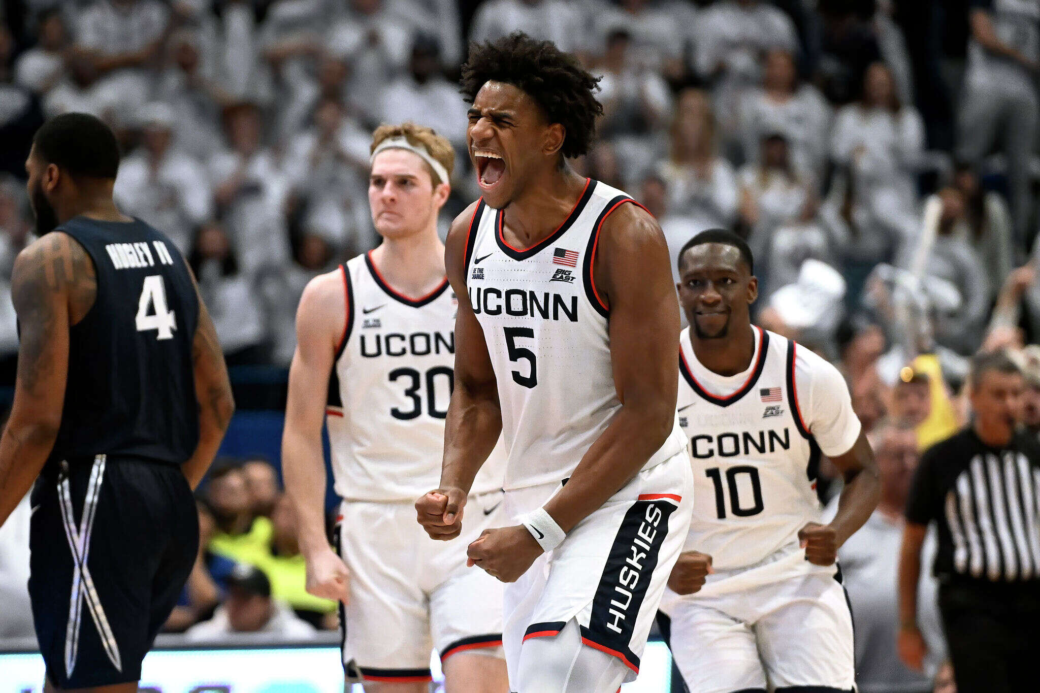 UConn men's basketball holds off Xavier in overtime to win Big East opener