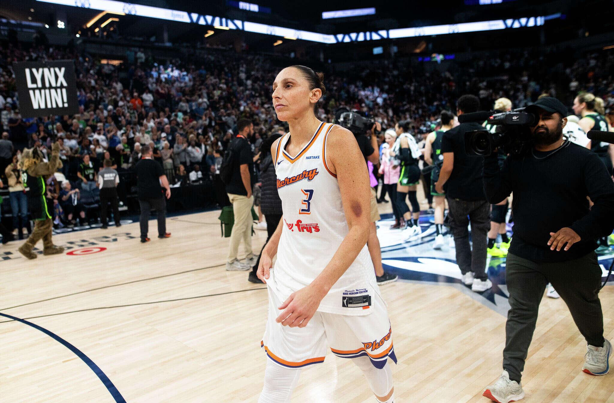 UConn great Diana Taurasi walks off court in what may have been her final game