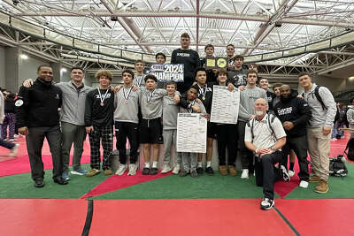 Xavier wrestling breaks points record in State Open three-peat