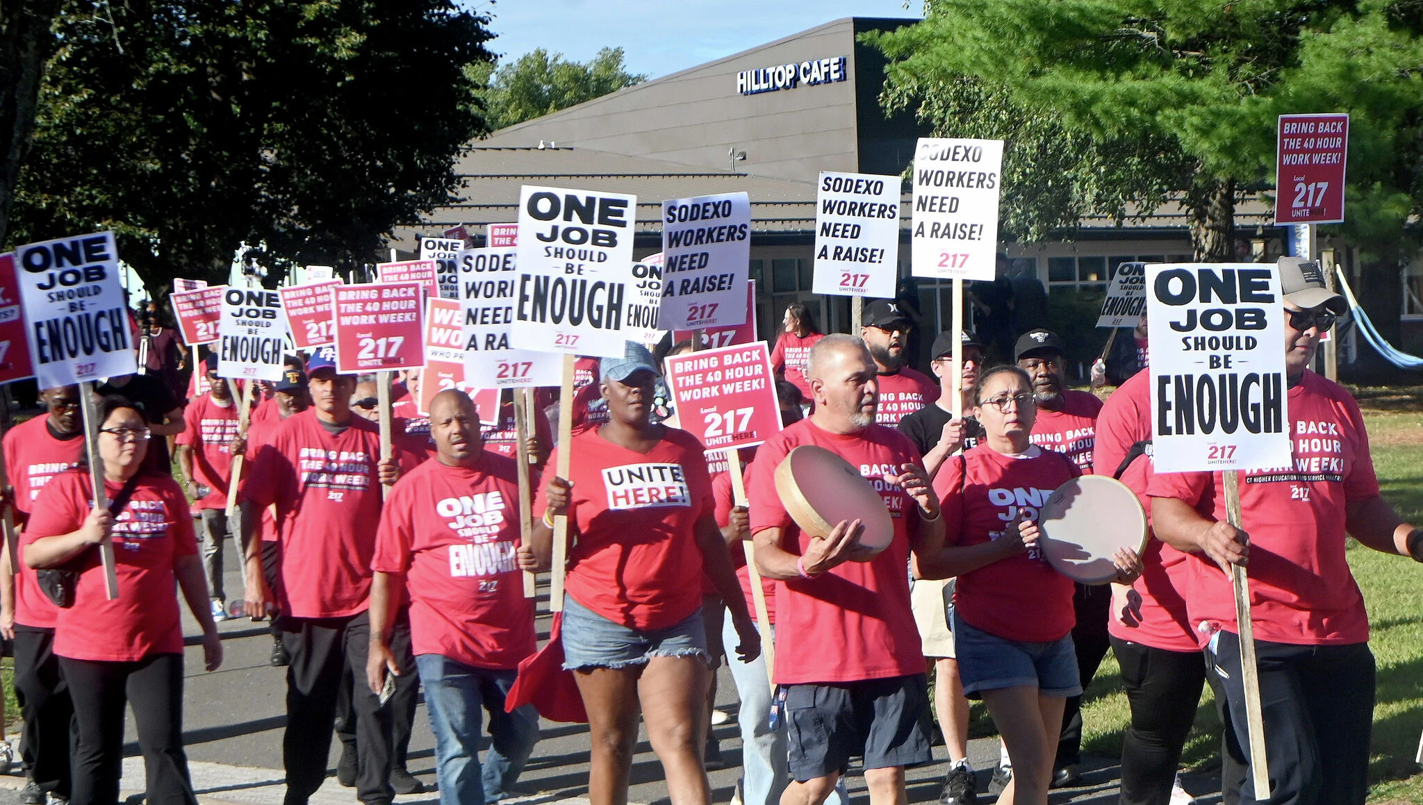 Food-service workers at CT colleges rally for higher pay they say is 'essential'