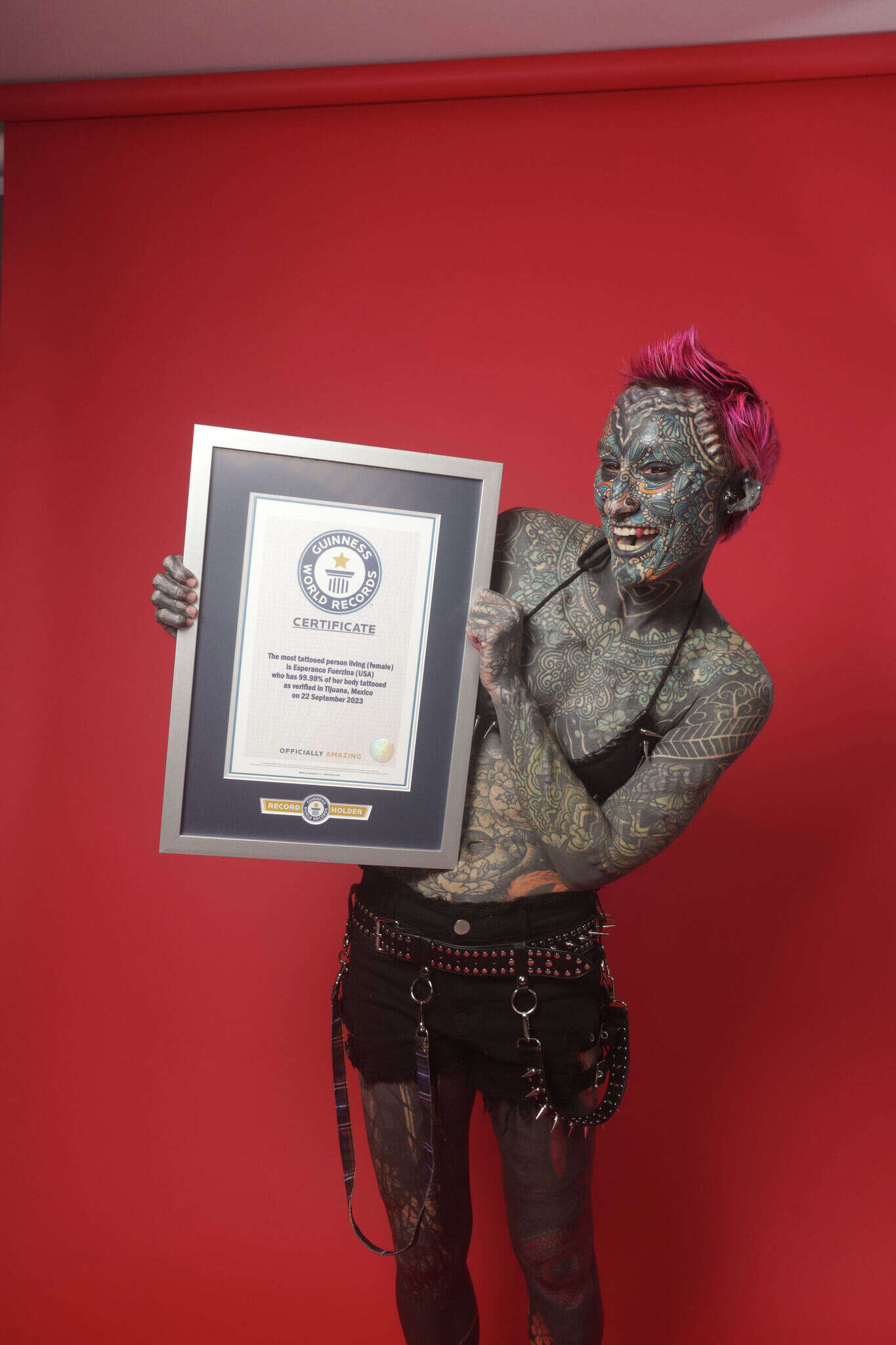 CT woman becomes world record holder for most tattoos, body modifications