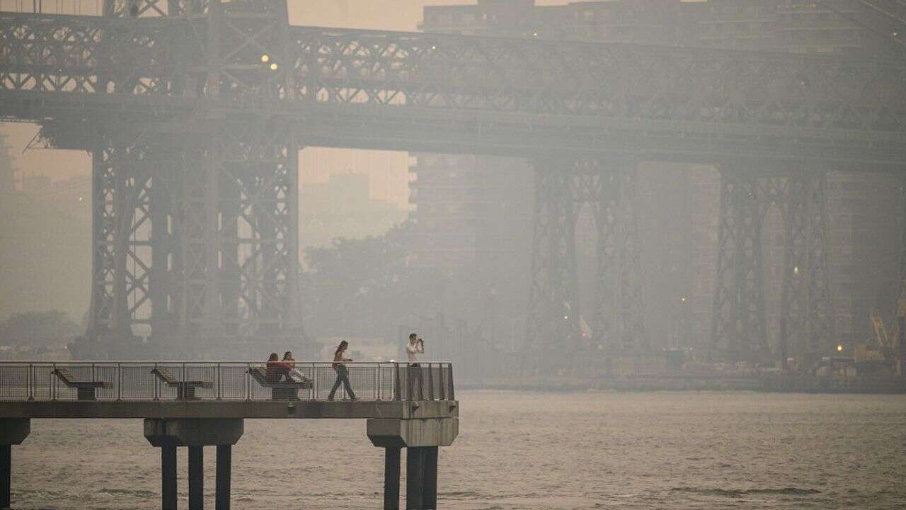 EN IMAGES - New York dans un épais brouillard à cause des méga-feux au Canada