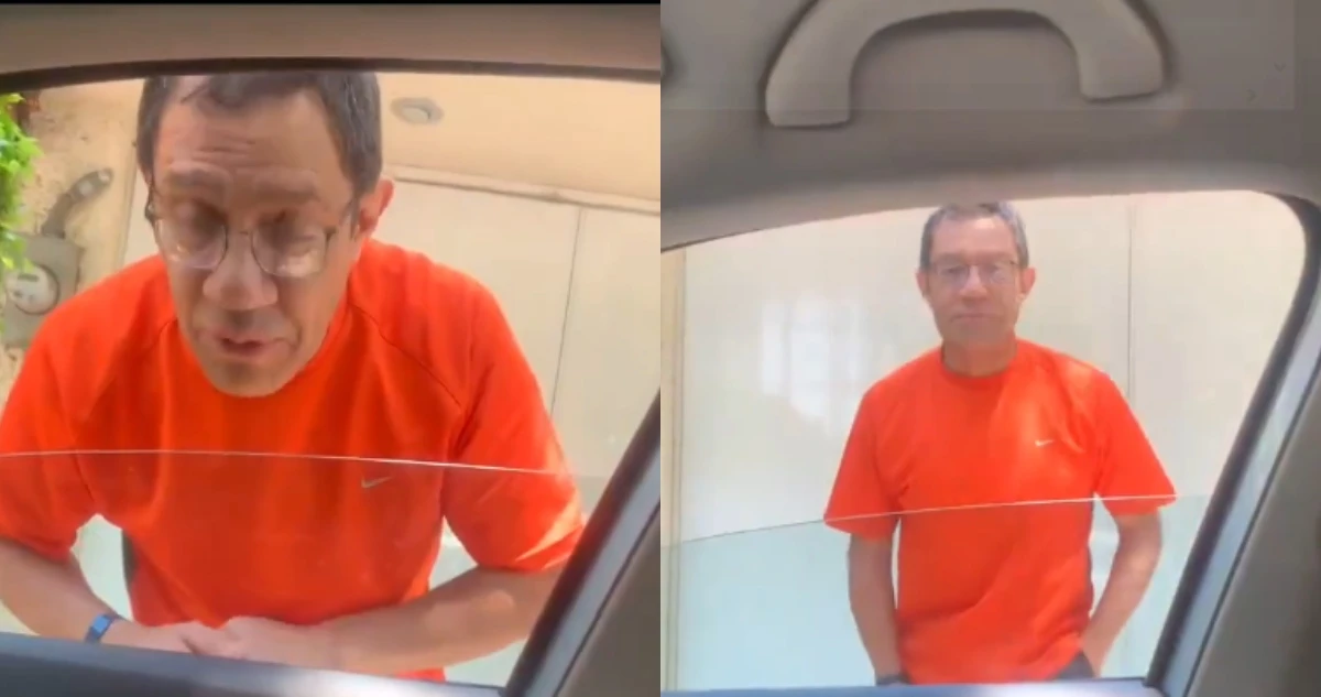 VIDEO ¬ Hombre amenaza con un arma de fuego a joven por estacionarse frente a su casa