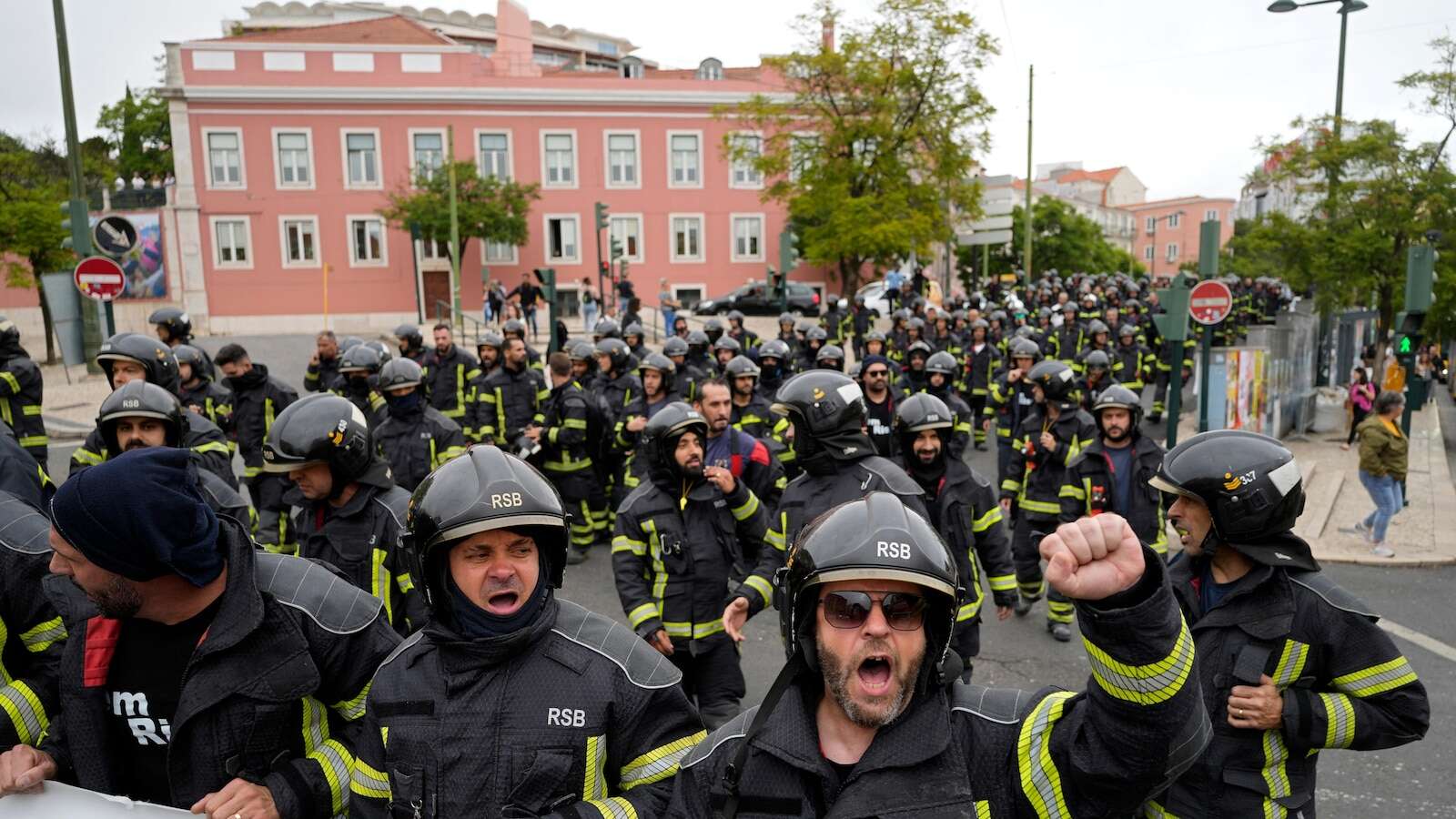 Portuguese firefighters protest outside parliament over labor conditions