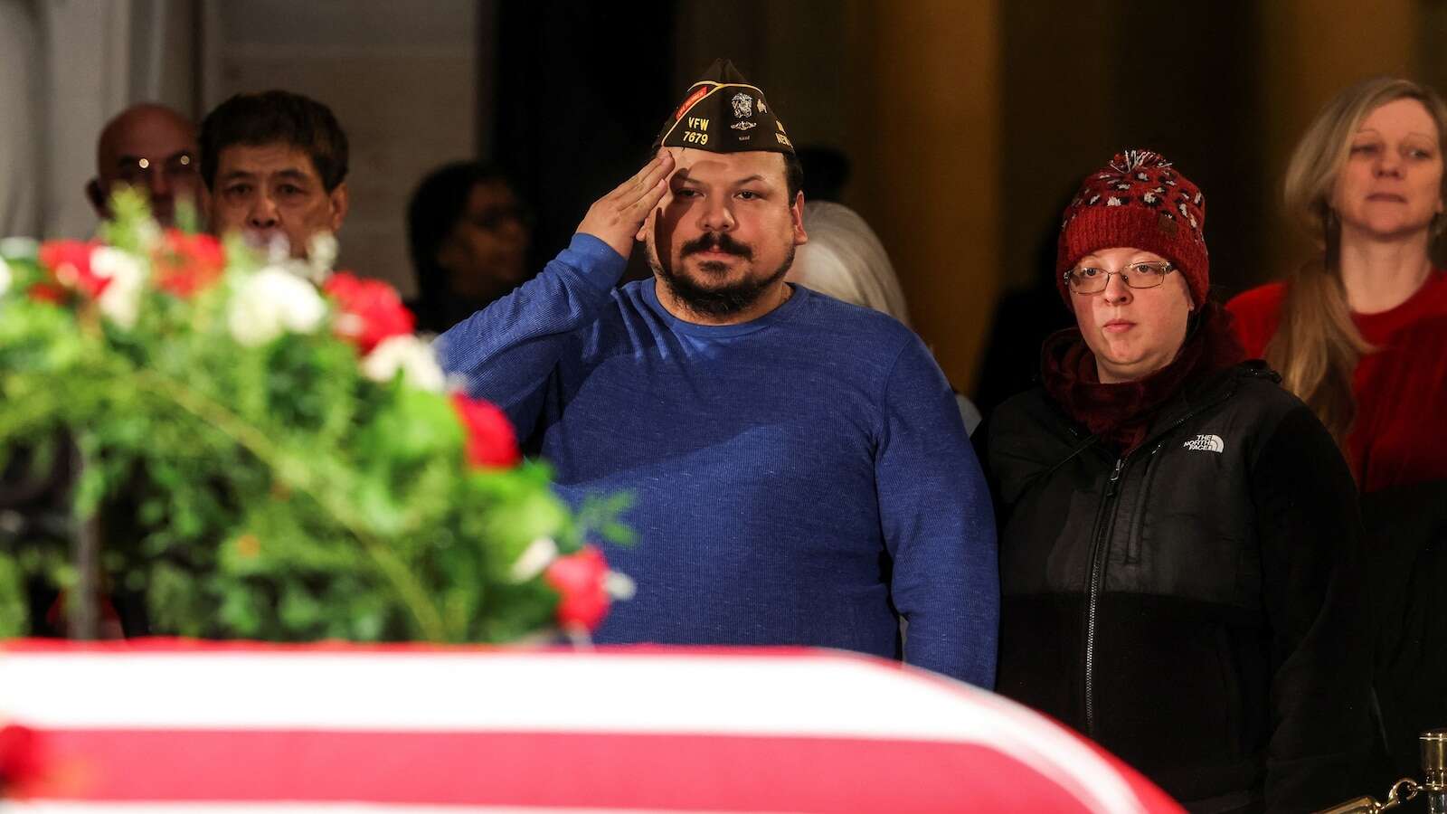 Mourners wait in long line and cold to say goodbye to Jimmy Carter at the Capitol