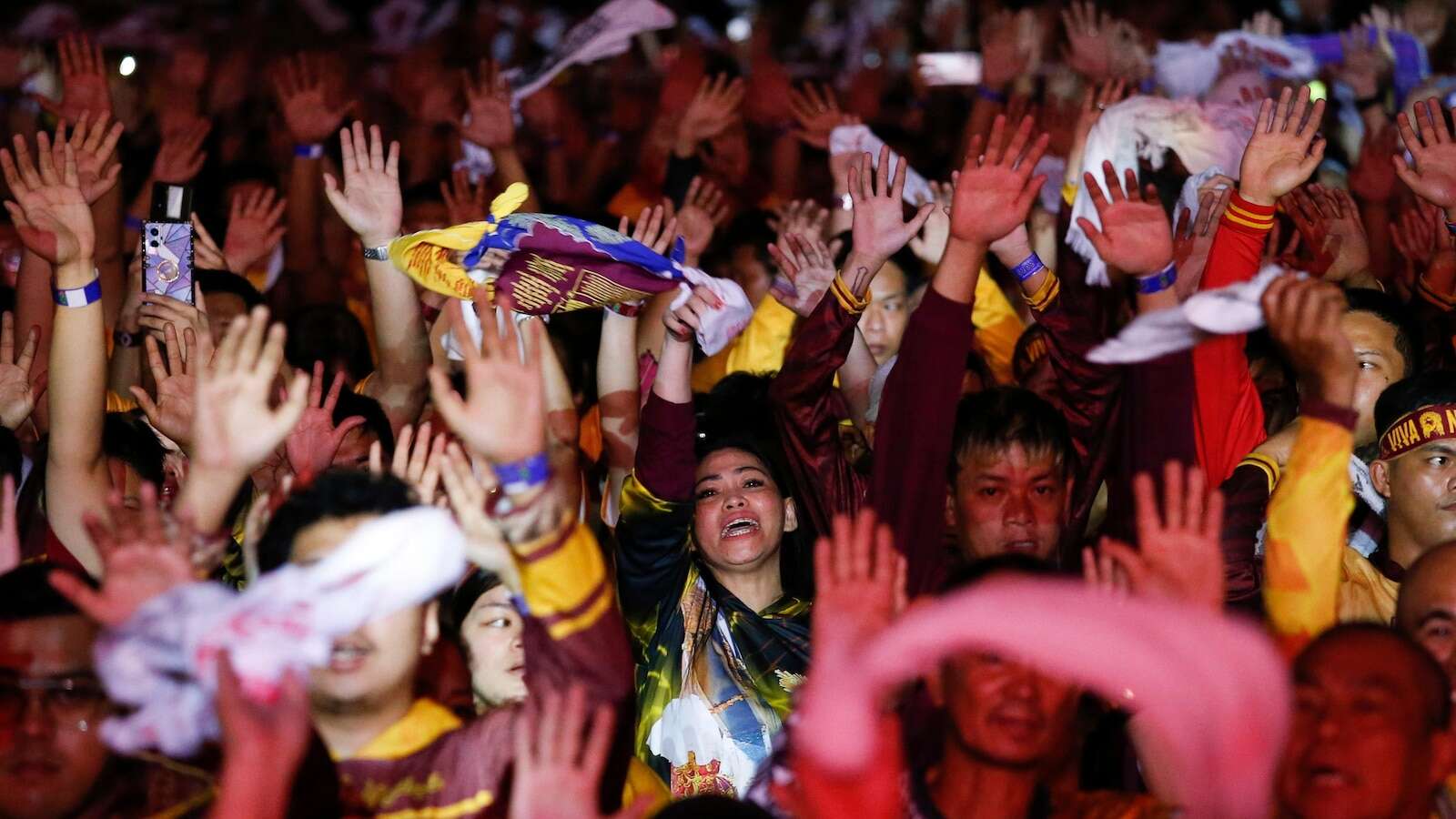 Filipino Catholics pray for good health and peace in huge procession venerating Jesus statue