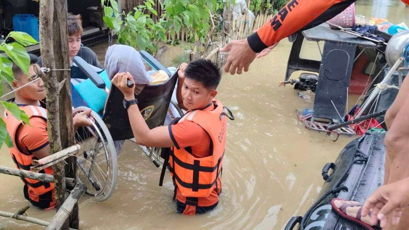 Tropical storm battering Philippines leaves at least 23 people dead in flooding and landslides