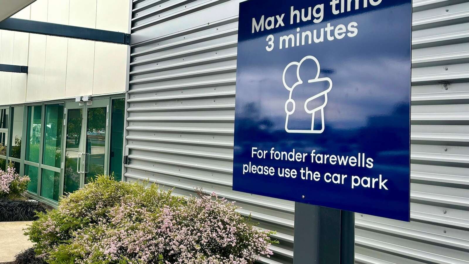 New Zealand airport imposes cuddle cap with 3-minute limit on goodbye hugs to avoid traffic jams