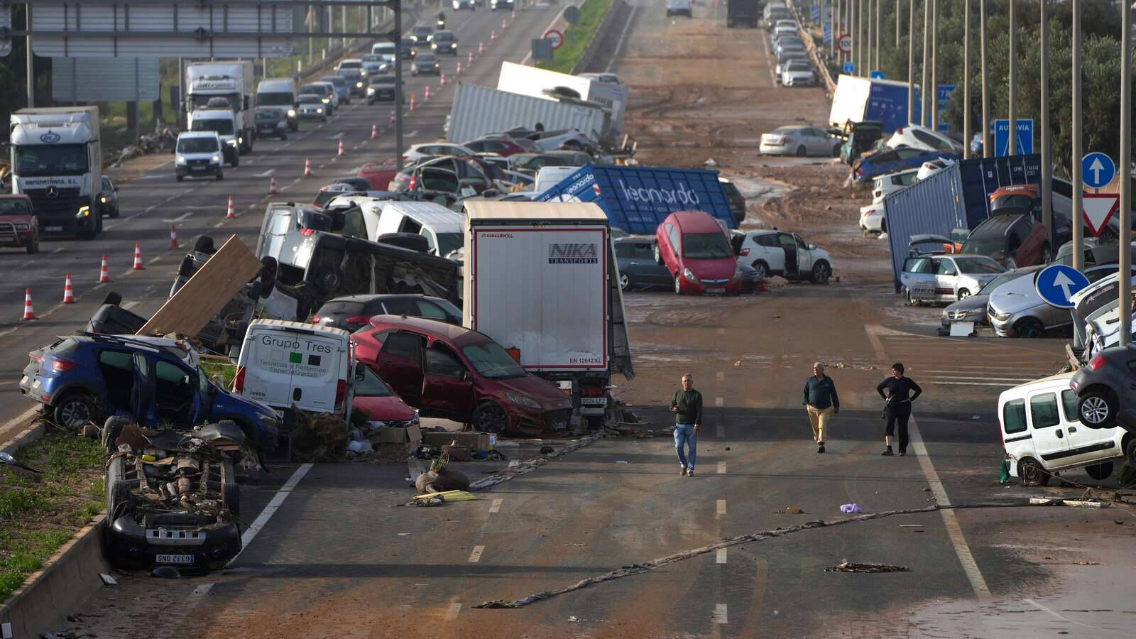 Flood survivors say regional Spanish officials waited too long to warn them of the danger