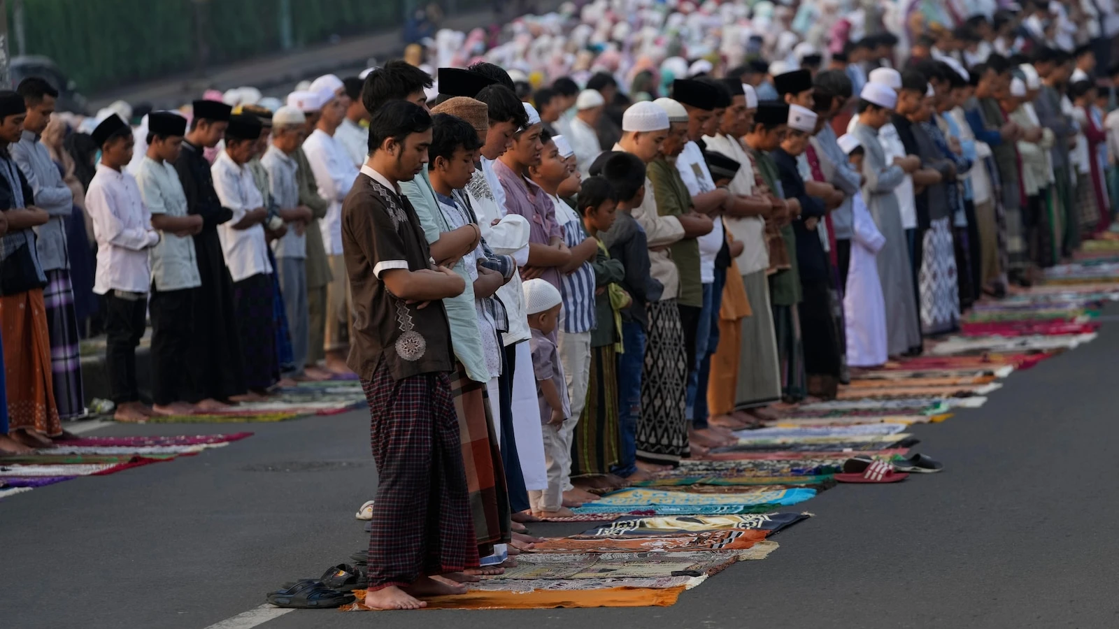 Muslims in Asia celebrate Eid al-Adha with sacrifice festival and traditional feast
