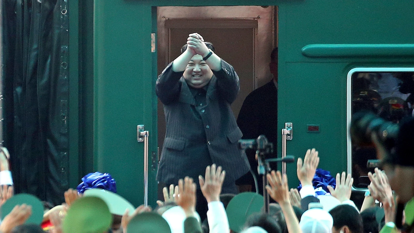 Kim Jong Un rides his trademark train to China. He also has a plane, limos and horses