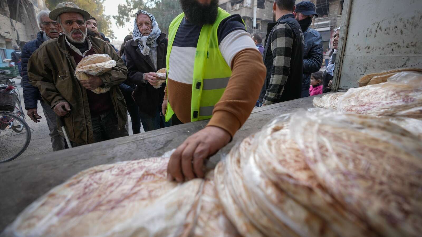 Palestinian refugees return to Yarmouk amid questions about their place in the new Syria