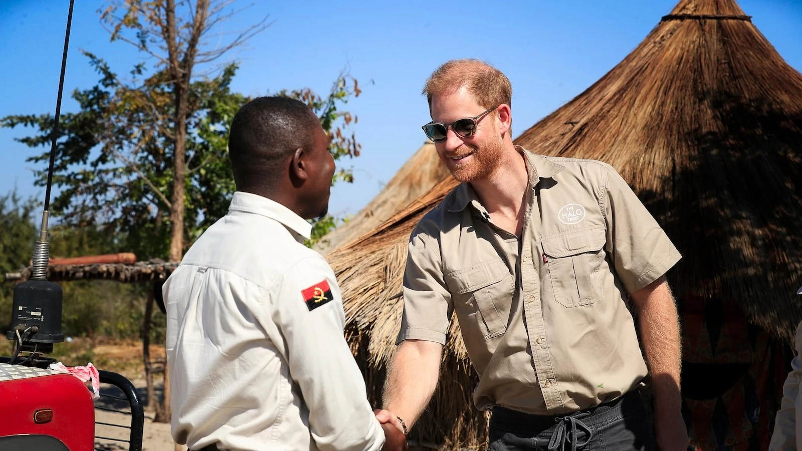 Prince Harry retraces Diana's footsteps by walking through a land mine field in Angola for charity