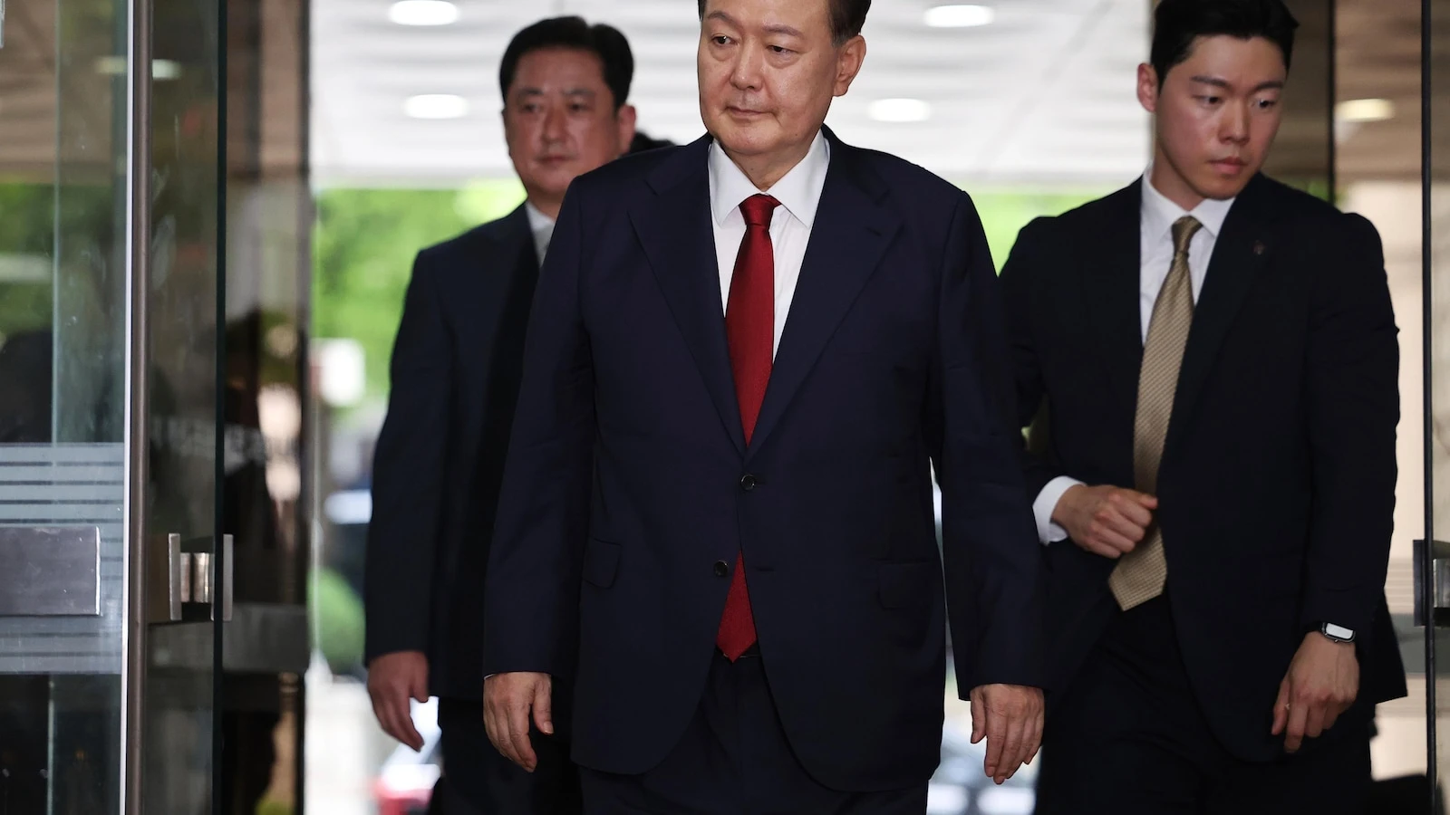 Ex-South Korean leader Yoon appears in Seoul court for hearing on possible arrest warrant