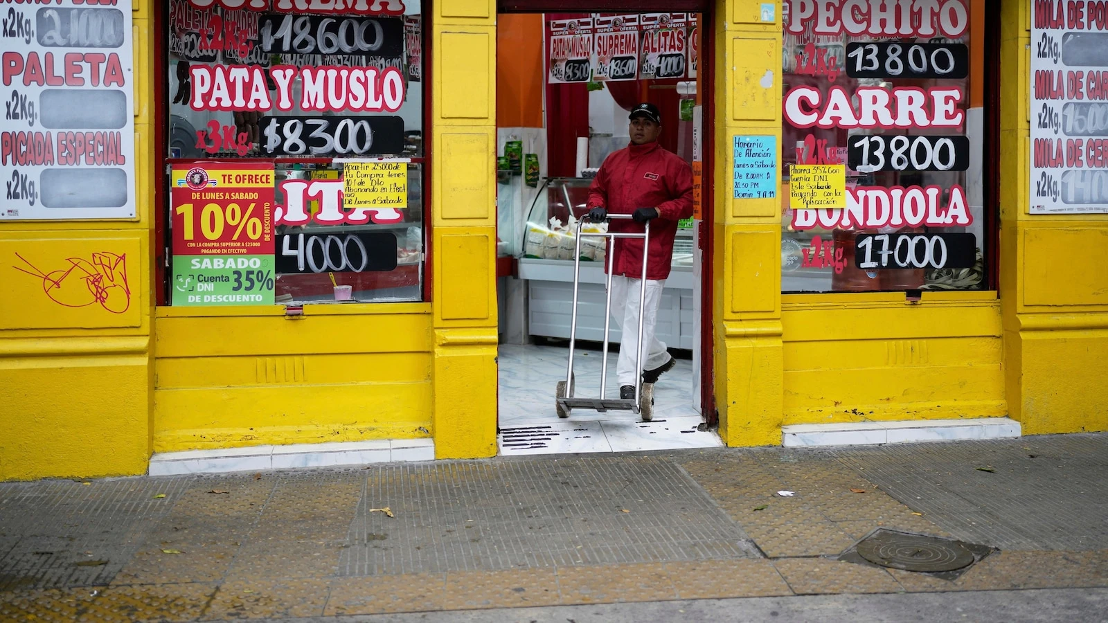 Argentina says it will lift the country's strict currency controls with help from the IMF