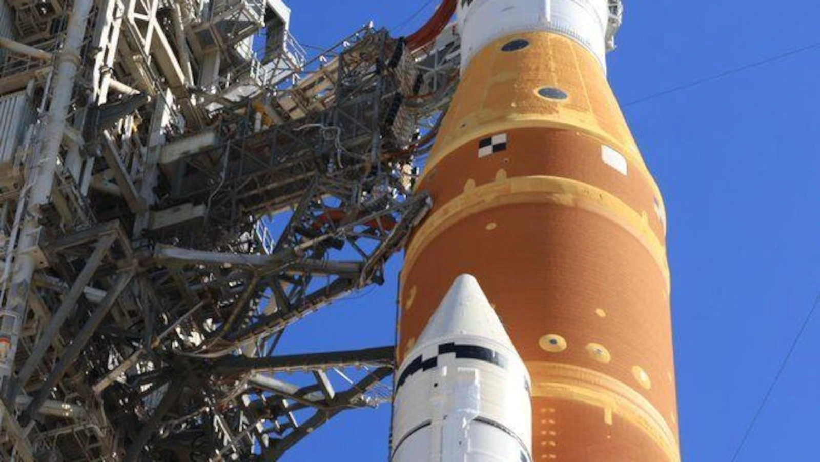 NASA will return its moon rocket to the hangar for more repairs before astronauts strap in