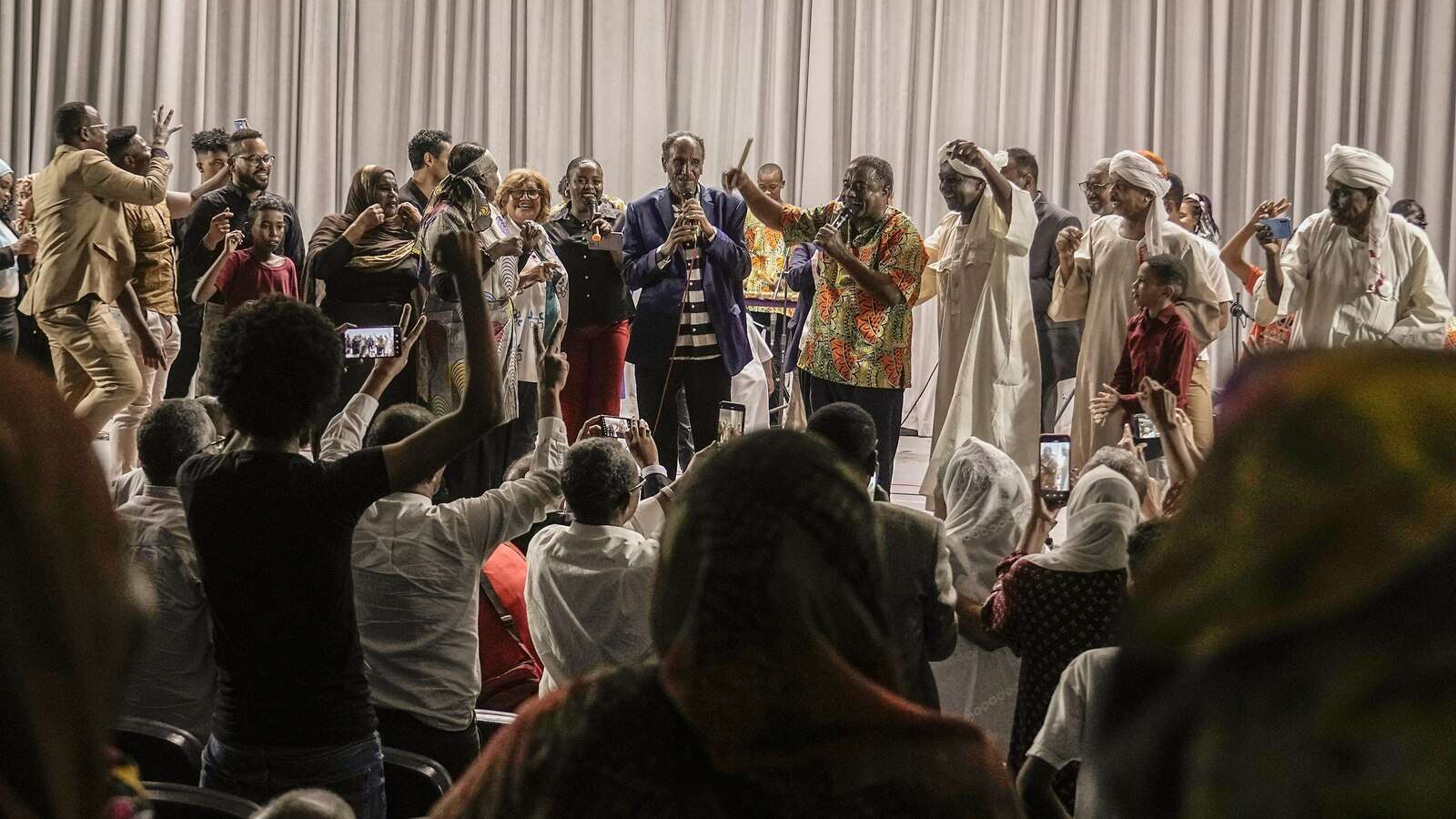 In music and dance, Sudanese performers transport refugee audiences back home