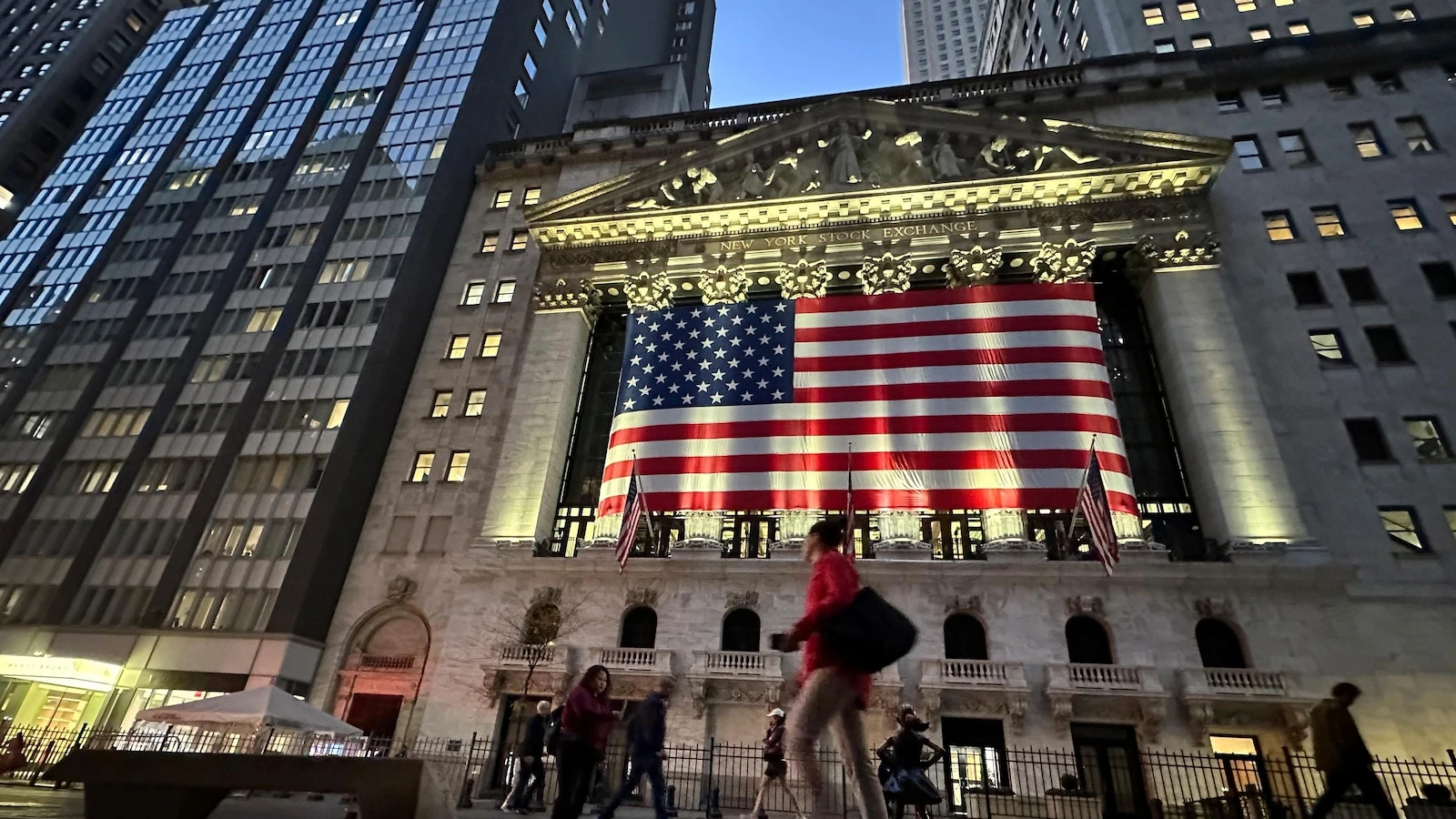 Asian benchmarks are mixed after Wall Street edges down from record highs