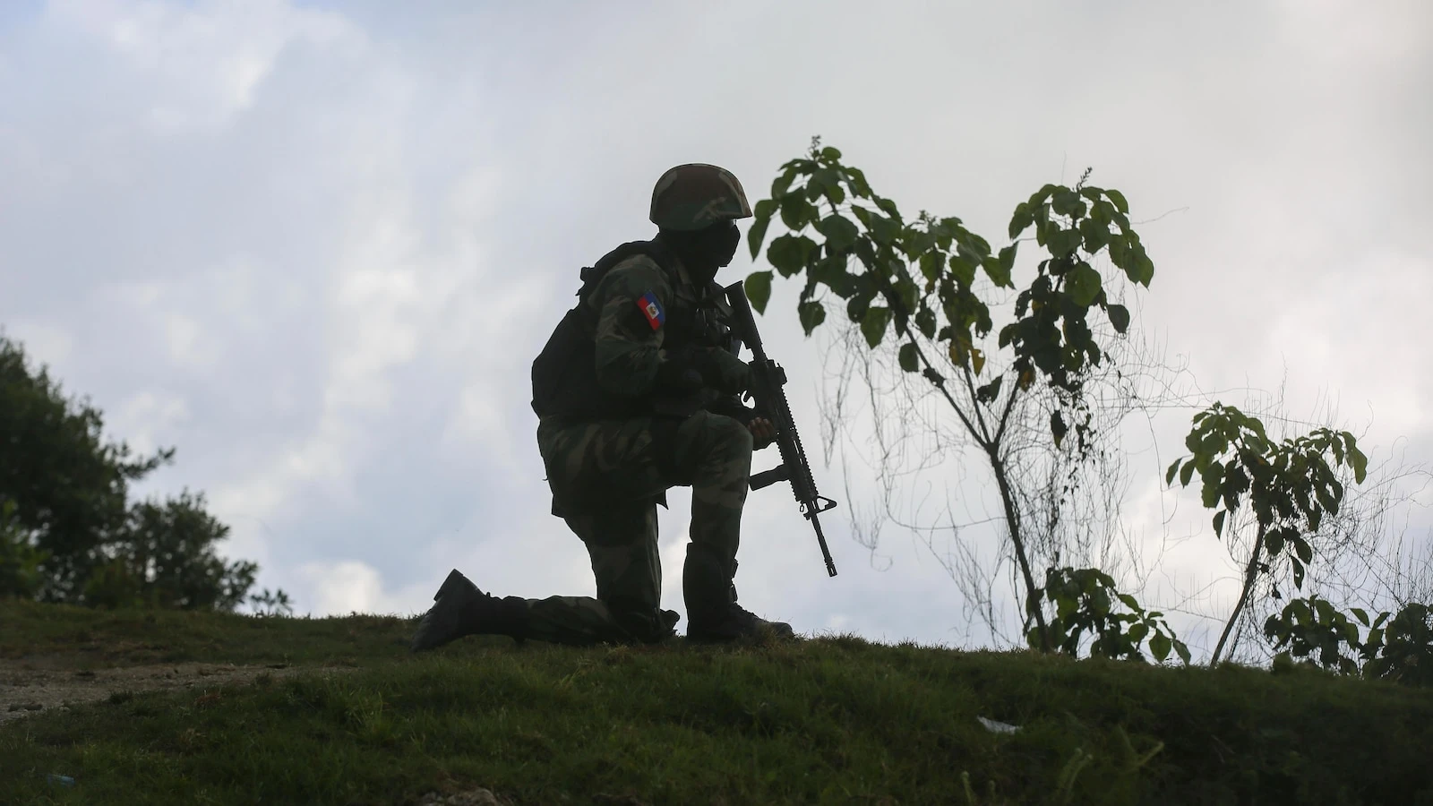 3 Haitian soldiers warring with gangs are slain outside of Port-au-Prince