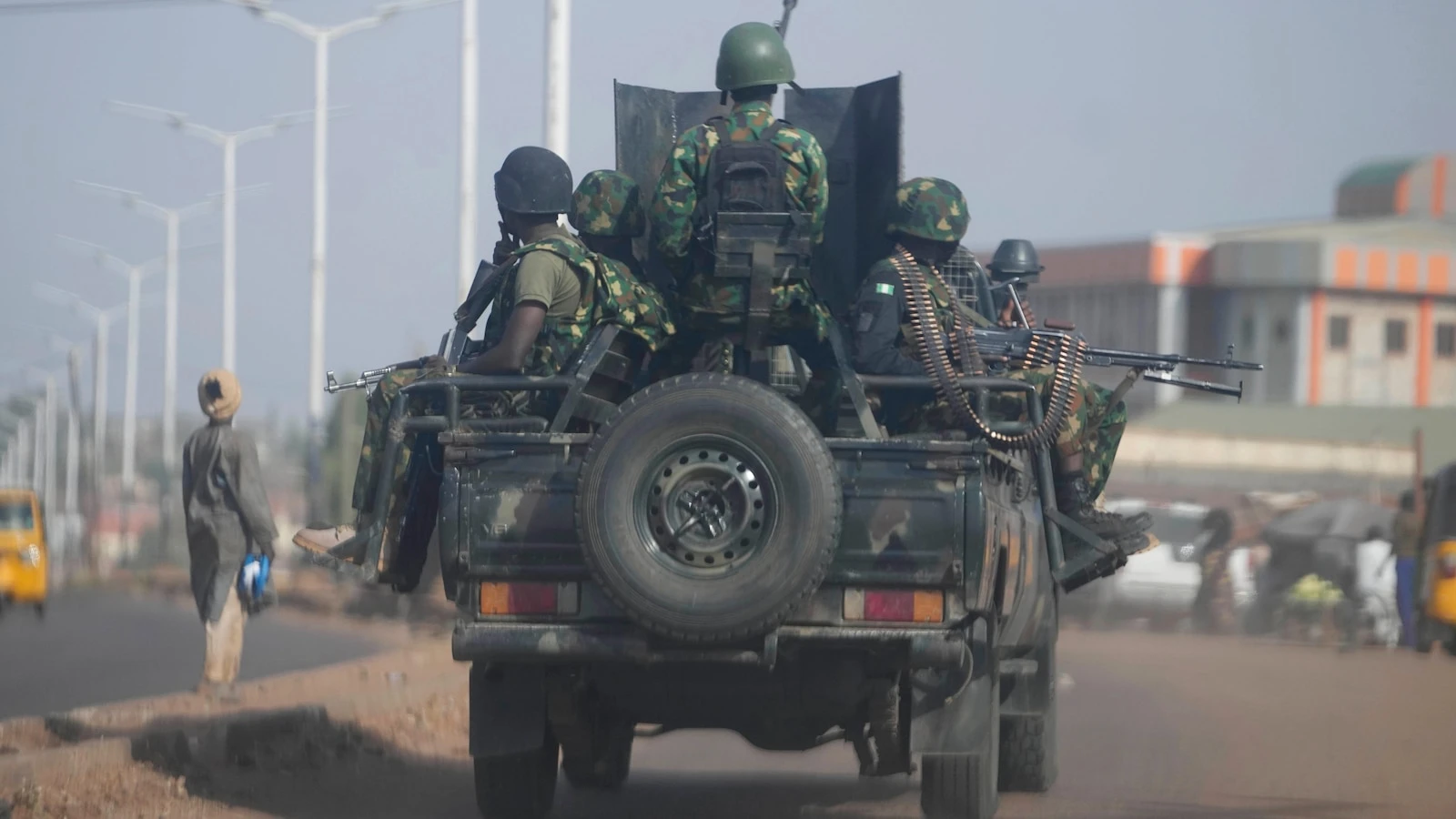 Gunmen kill at least 13 people in a mosque shooting in northwestern Nigeria