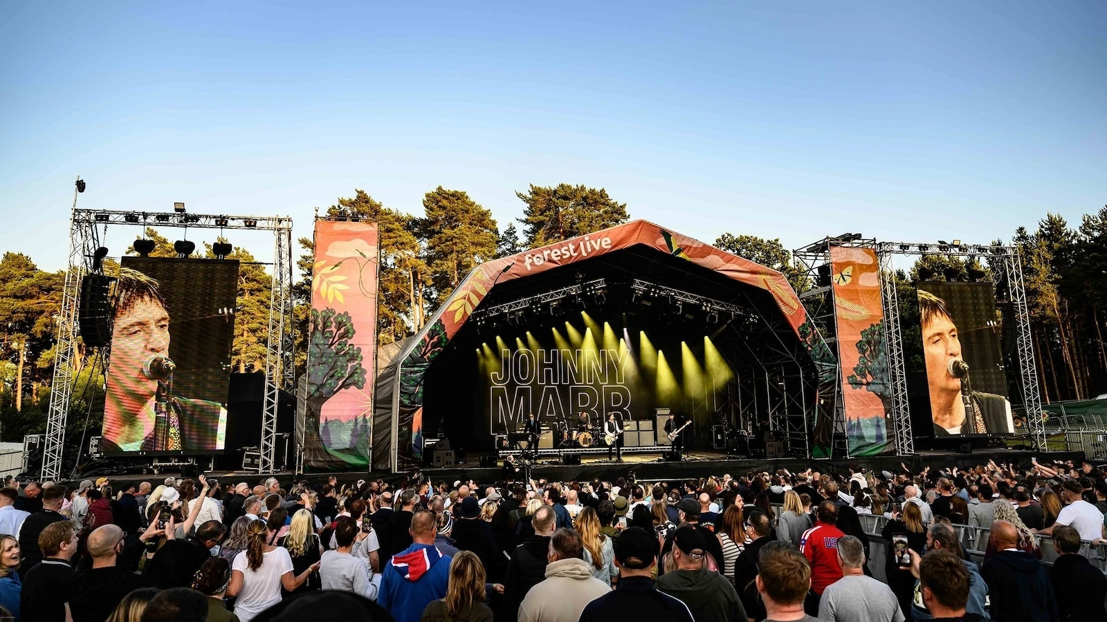 A concert series in England where top artists perform in protected, preserved forests