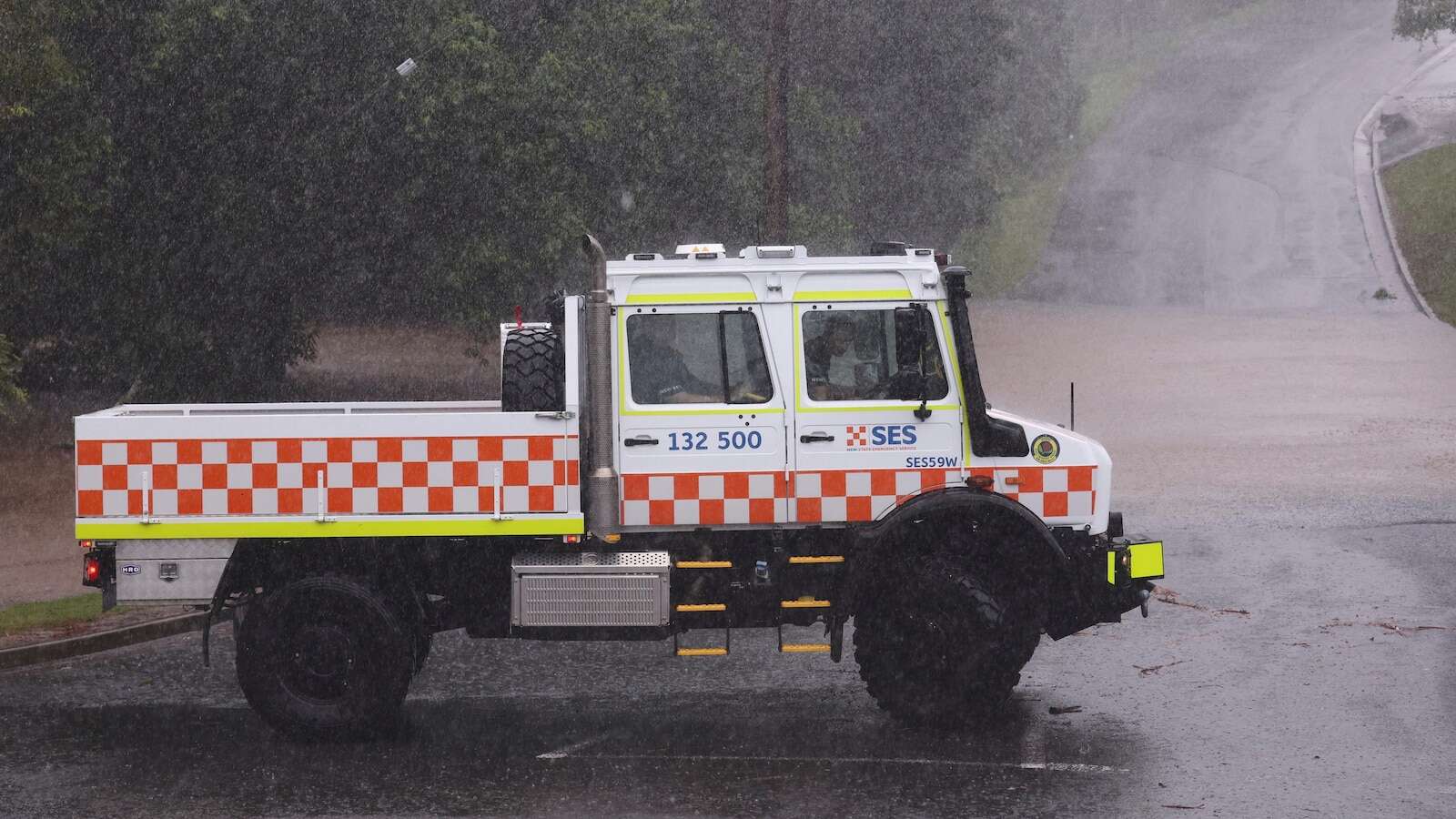 Australian homes lose power and people told to evacuate as tropical cyclone approaches