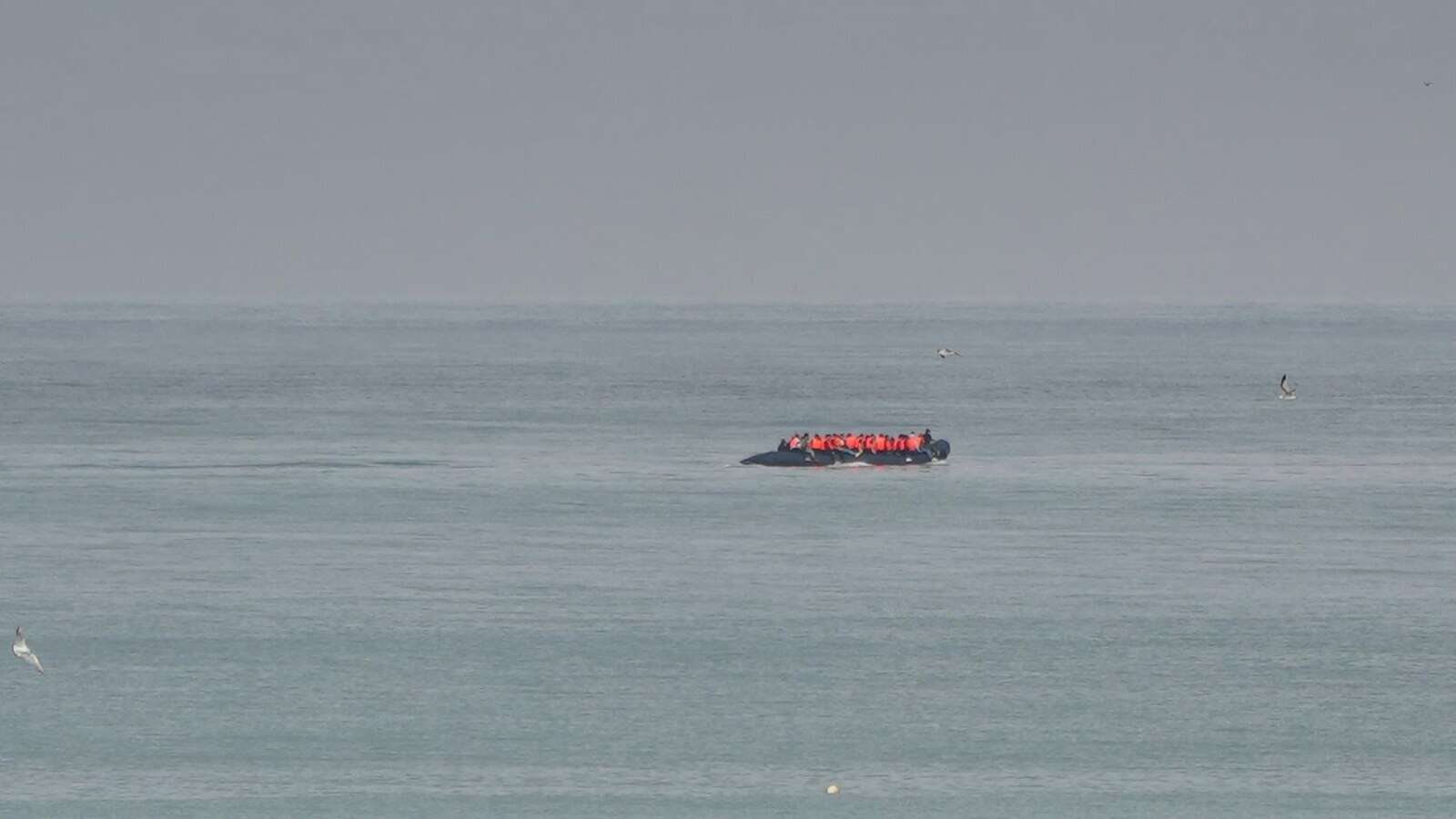 Migrant boat seen trying to make an apparent crossing of English Channel a day after 12 people died