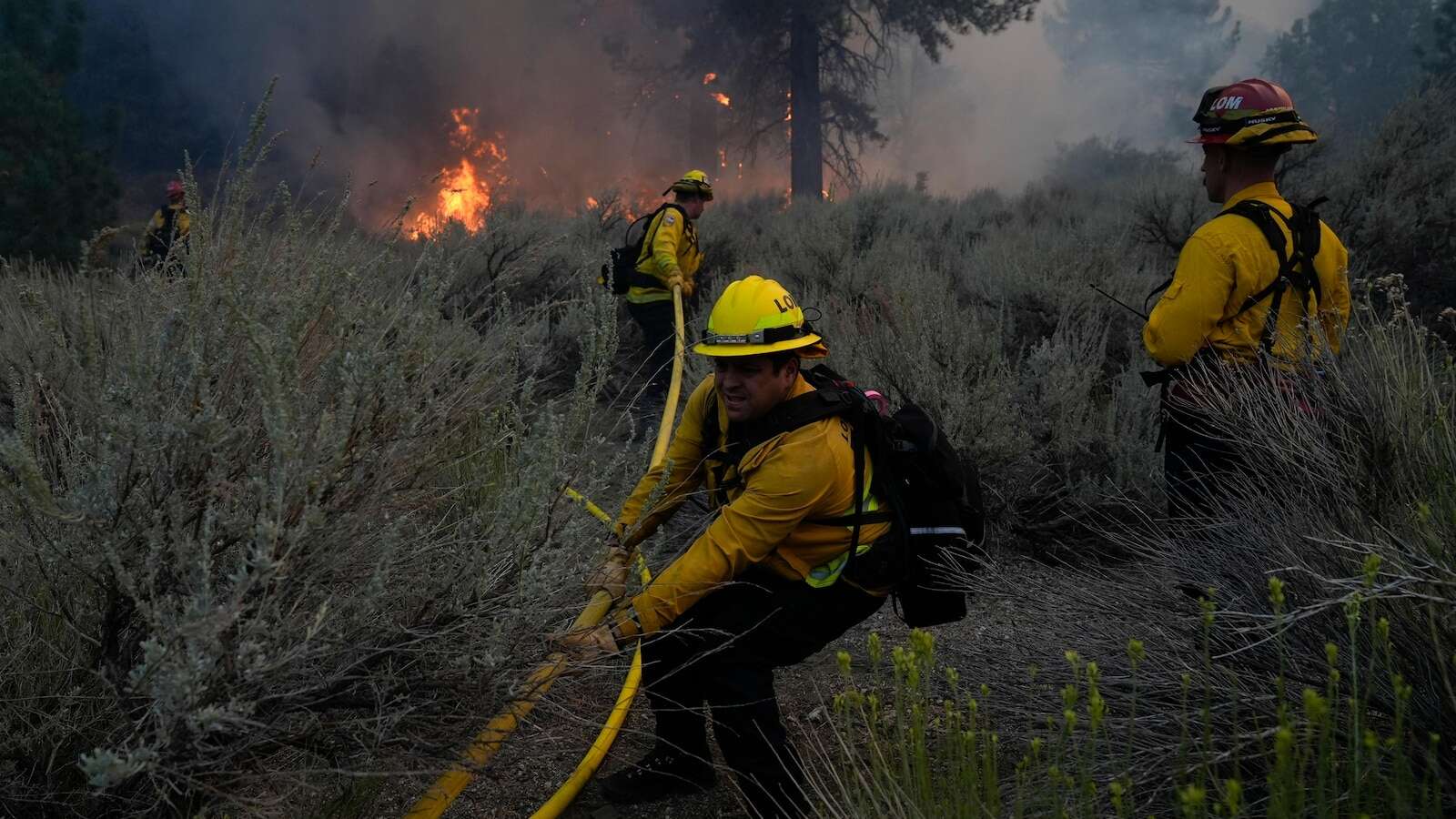 AP PHOTOS: Hallmarks of climate change seen in floods, fires and drought around the globe