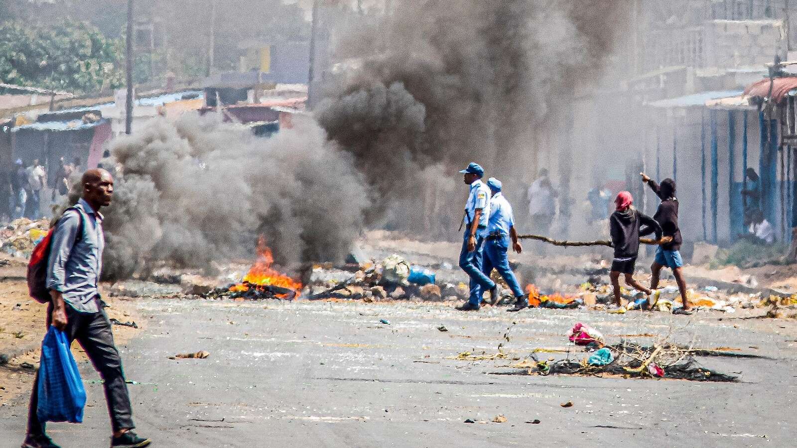 South Africa closes its border again with Mozambique, where post-election violence worsens