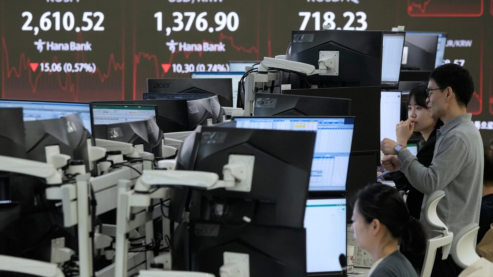 Asian shares slip as worries about U.S. debt send Wall St tumbling