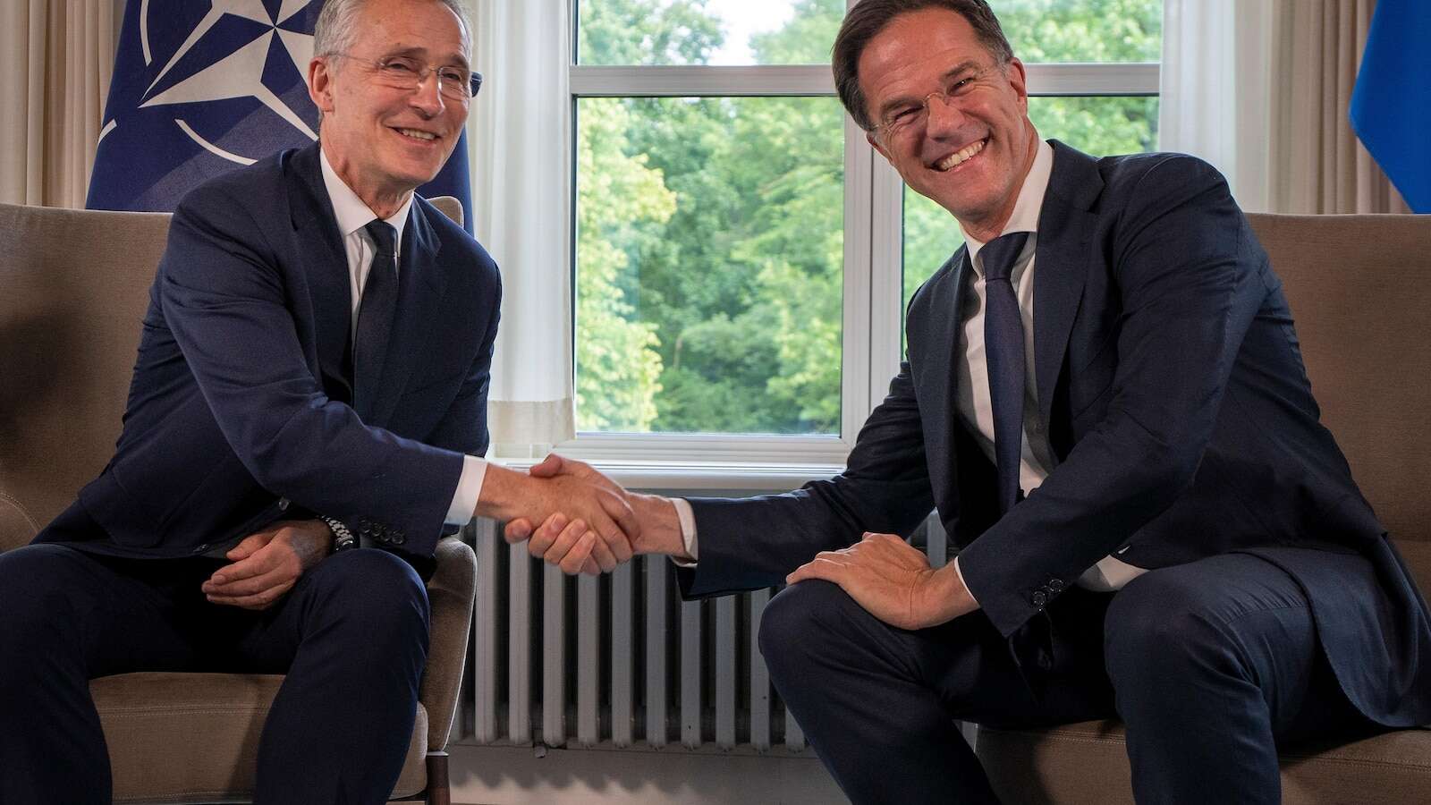 NATO's long-time chief hands over to a former Dutch premier