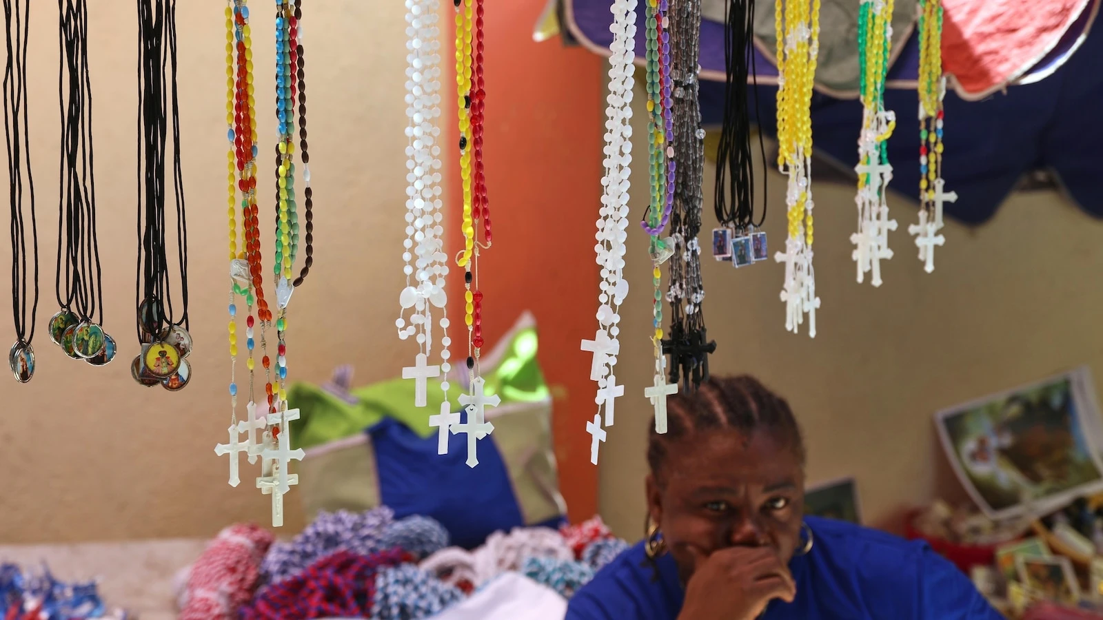 Thousands of Haitians mark annual pilgrimage far from a sacred waterfall surrounded by gangs