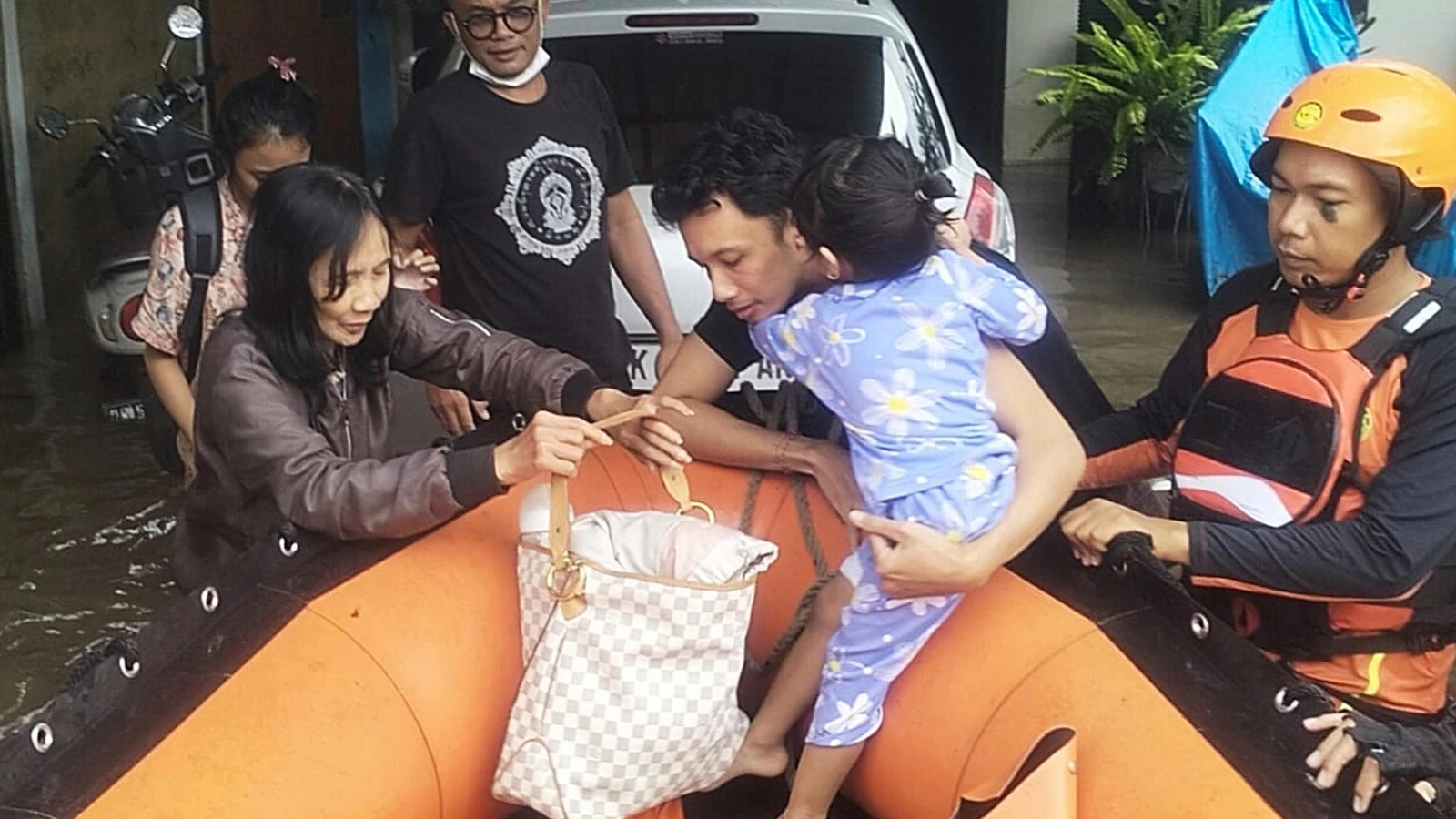 Indonesian rescuers search for missing people as floods recede