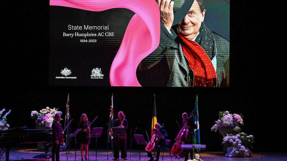 King Charles pays light-hearted tribute to comedian Barry Humphries at Sydney memorial service