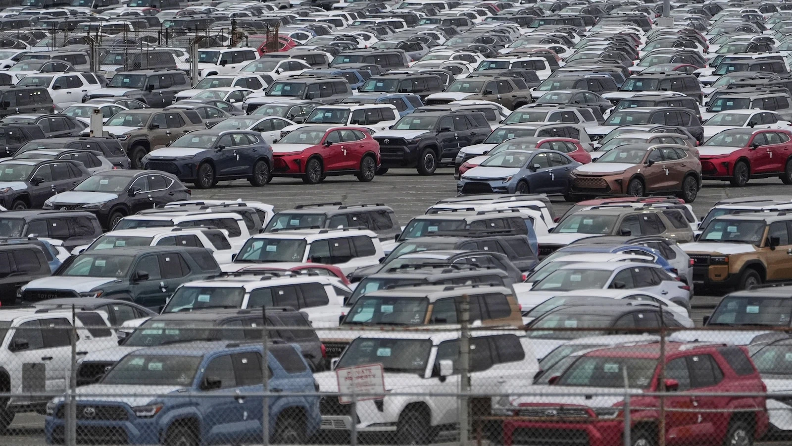 Toyota reports booming sales but stays cautious on profit because of various costs