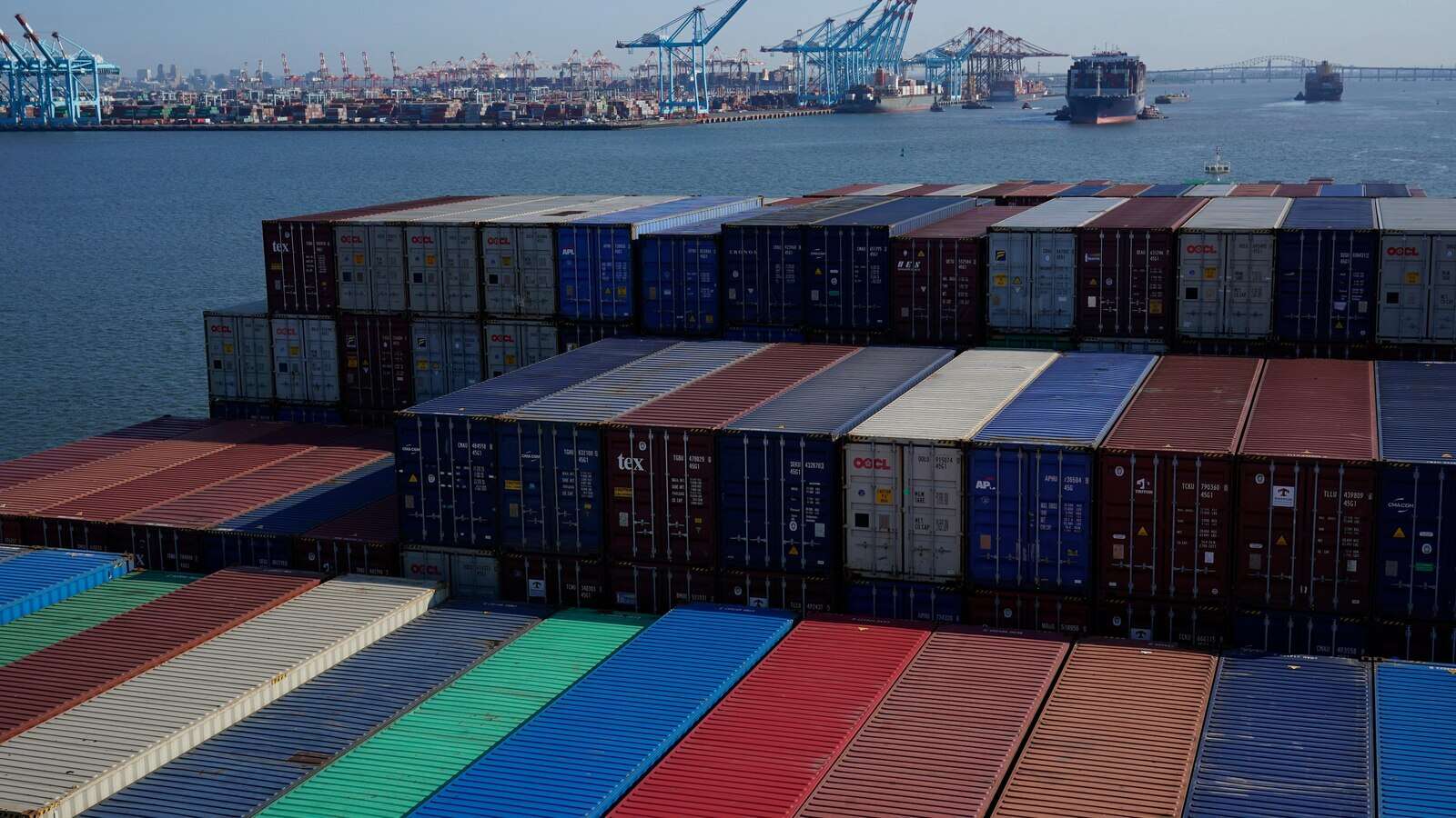 Longshoremen at key US ports threatening to strike over automation and pay