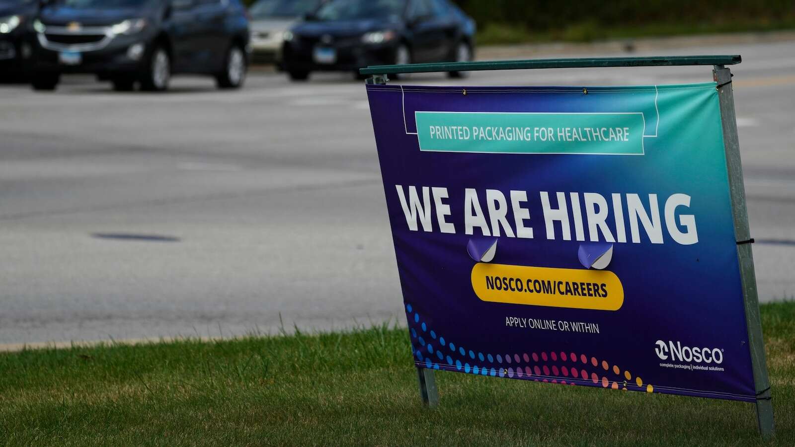 Number of Americans seeking jobless benefits falls as employers hold on to workers