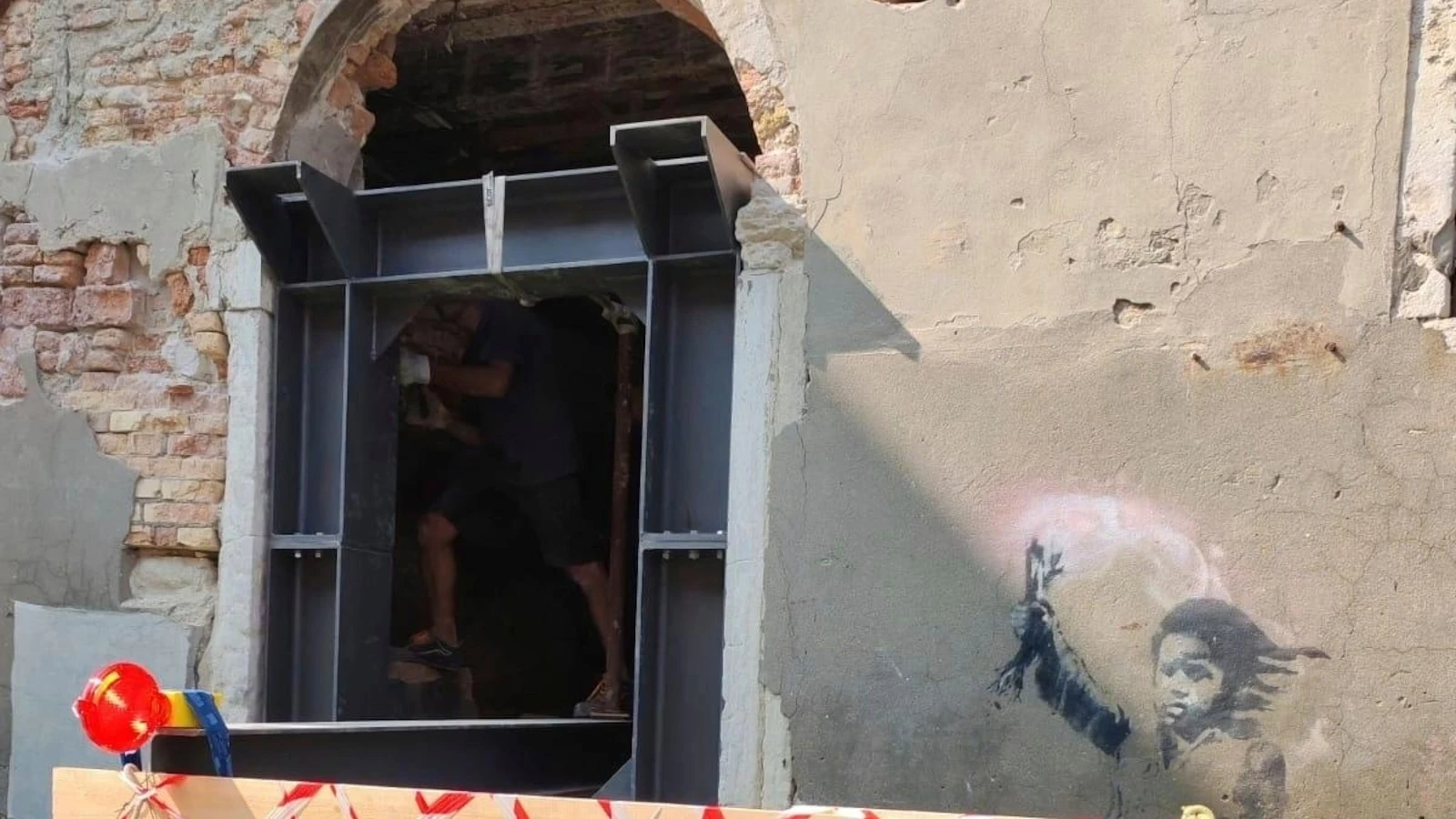Banksy work 'The Migrant Child' removed from Venetian palazzo for restoration and future display