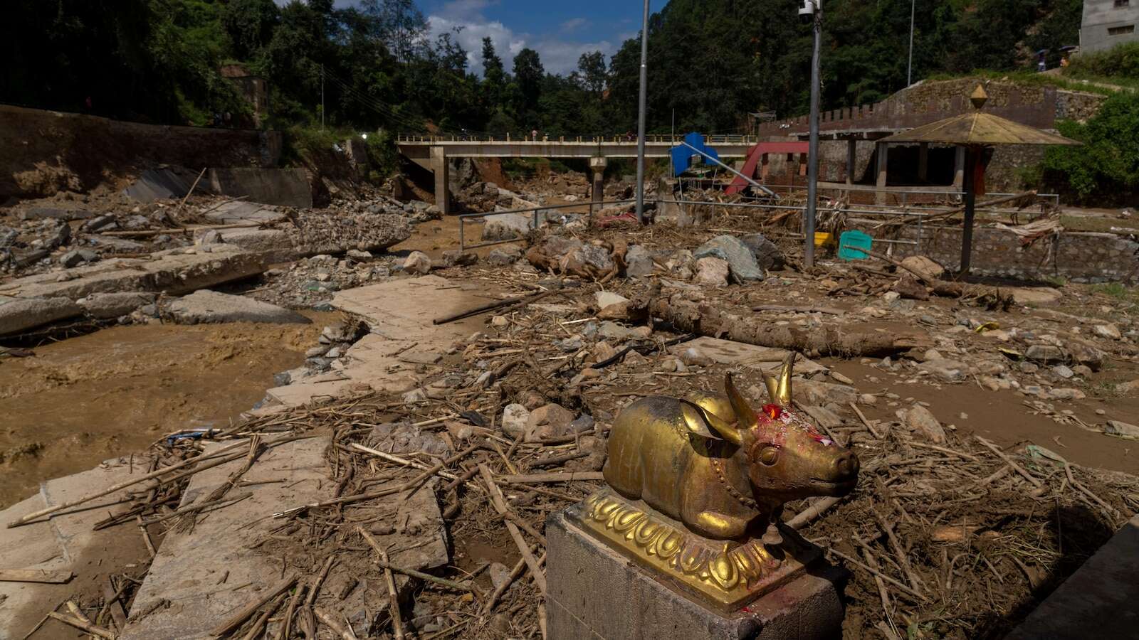 AP PHOTOS: Nepalese grapple with loss after floods kill over 200 people