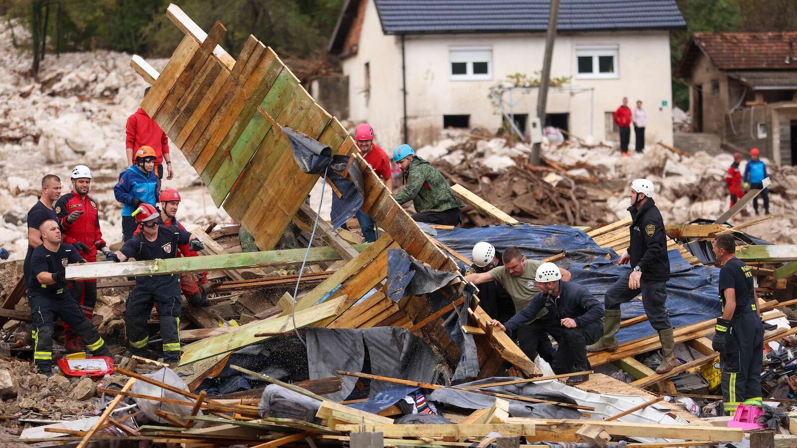 Rescue teams search for missing after floods, landslides kill at least 16 in Bosnia