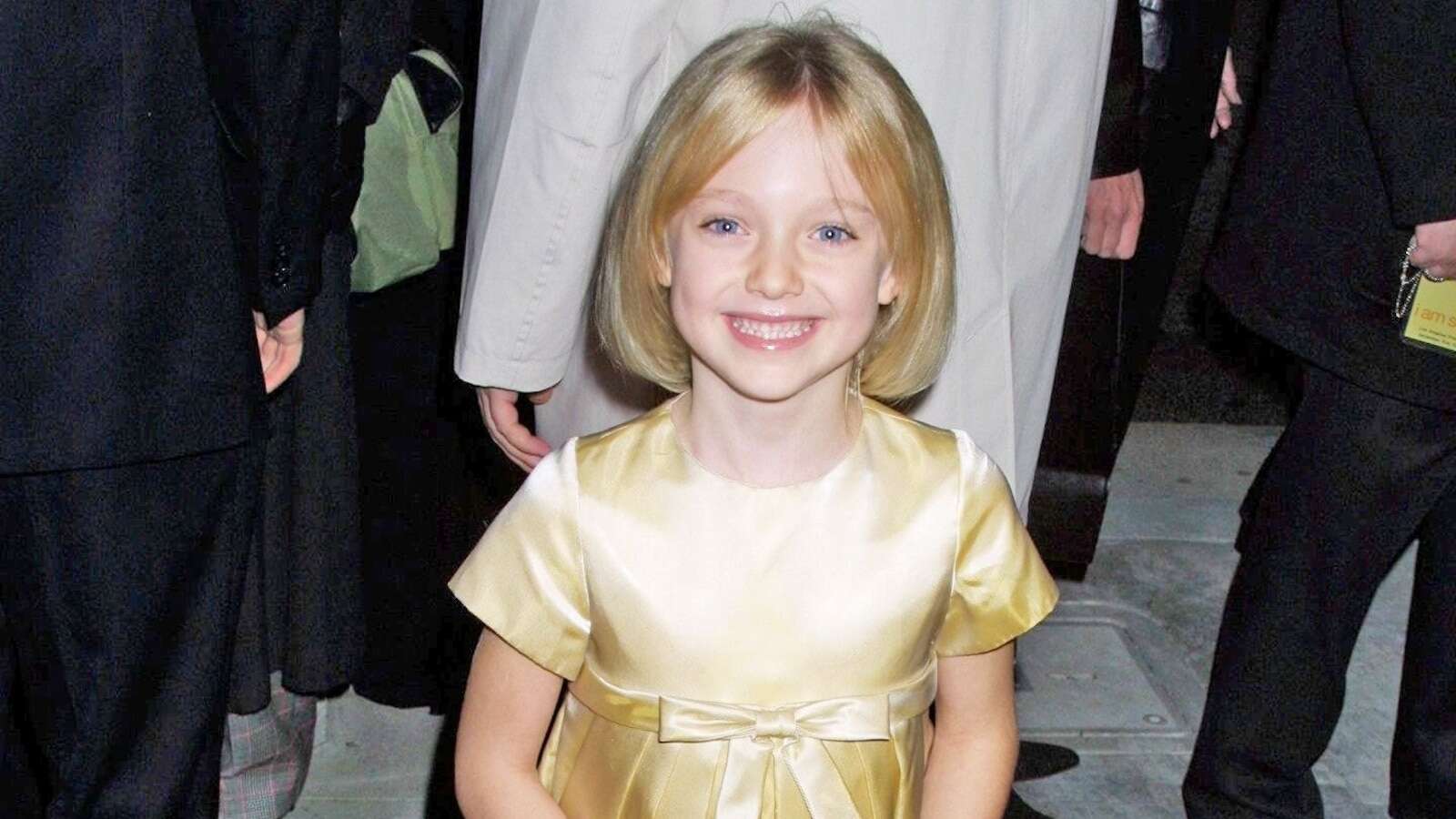 Matt Baron/BEI/ShutterstockDakota Fanning posts throwback photo from 'I Am Sam' premiere: 'Keeping her close'Fanning starred alongside Sean Penn in 