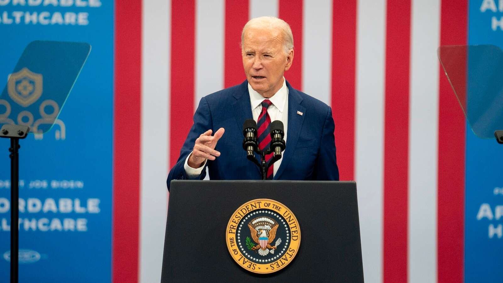 Biden fundraiser with Obama, Clinton sees jokes and some protests over war