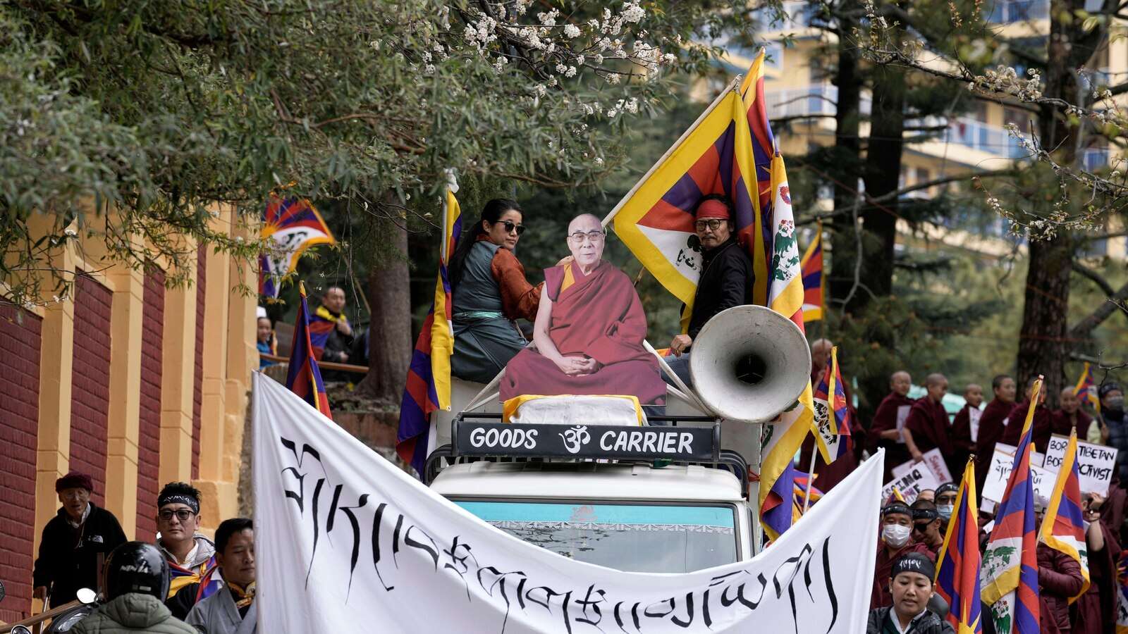 Tibetans scuffle with police outside the Chinese Embassy in India as they mark uprising anniversary