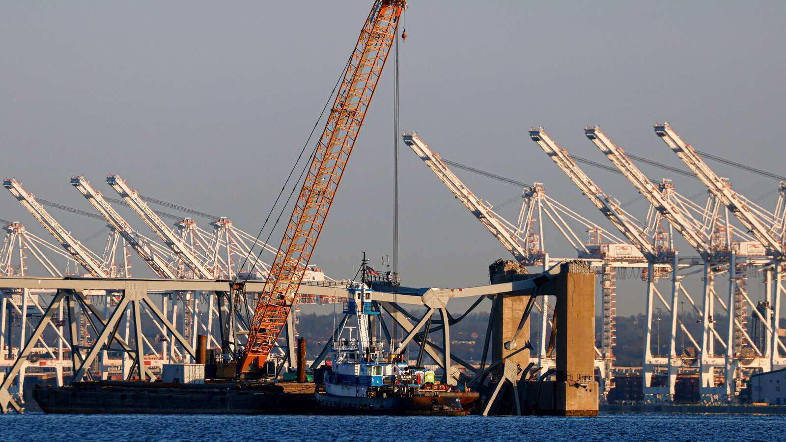 Crews at Baltimore bridge collapse continue meticulous work of removing twisted steel and concrete