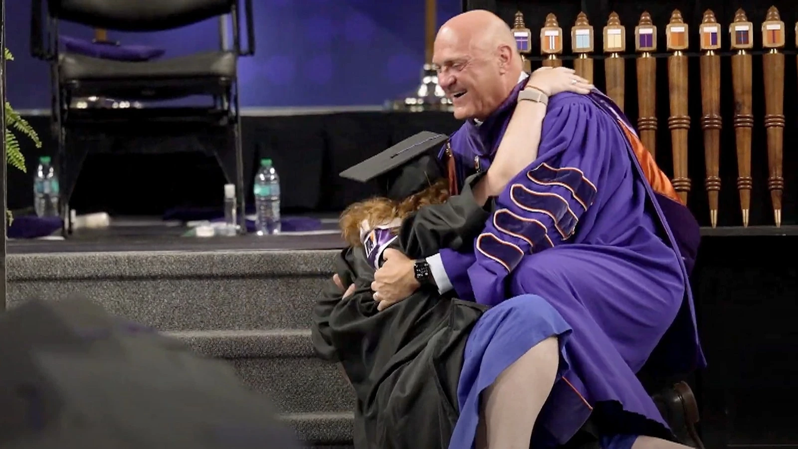 Clemson president gets 'joyful tackle' from graduating daughterClemson president James P. Clements shared a viral moment with his daughter.12 minutes ago