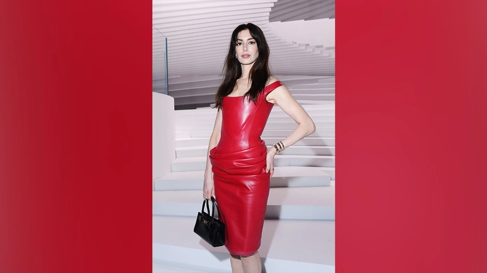 Anne Hathaway attends Versace show during Milan Fashion WeekThe 