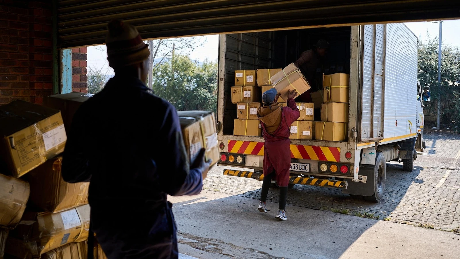 As Trump's tariff deadline looms, a clothing factory in the tiny African nation of Lesotho goes dark