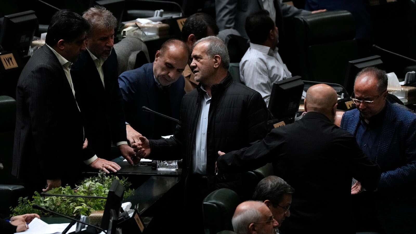 Iran’s parliament fires minister of economy over plummeting rial, mismanagement