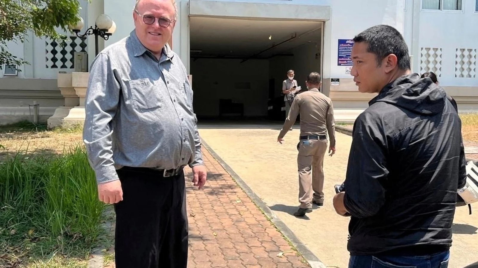 US scholar leaves Thailand after charges of insulting monarchy are dropped